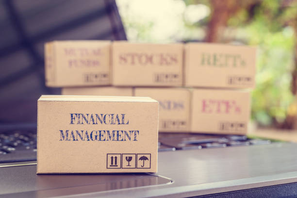 istock Box of financial management on a laptop 1248560079