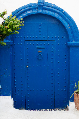 Blue door in the kasbah of the Udayas in Rabat, Morocco.