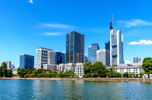 istock Beautiful view on  Frankfurt am Main skyline cityscape with blue sky, clouds, Main river in spring. Hessen, Hesse, Germany 1248561786