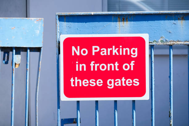 istock No parking in front of gate 24hr access required sign 1248563031