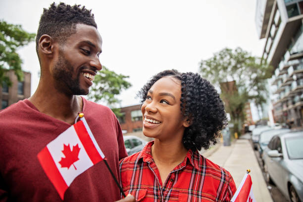 istock Canadian Couple Celebrating Canada Day 1248563153
