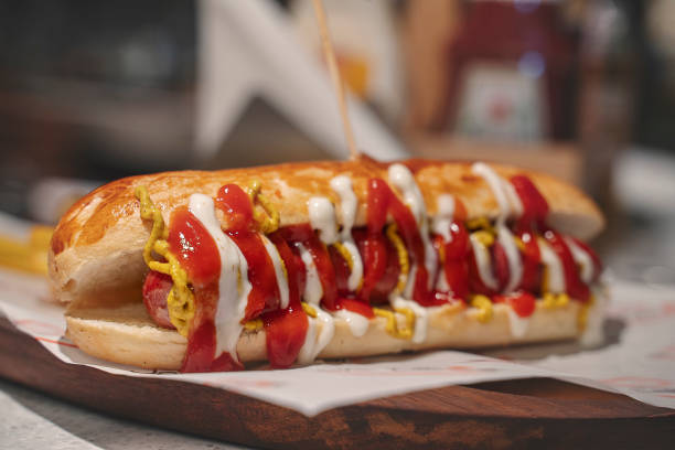 istock Hot dog with ketchup, mayonnaise and mustard 1248564580