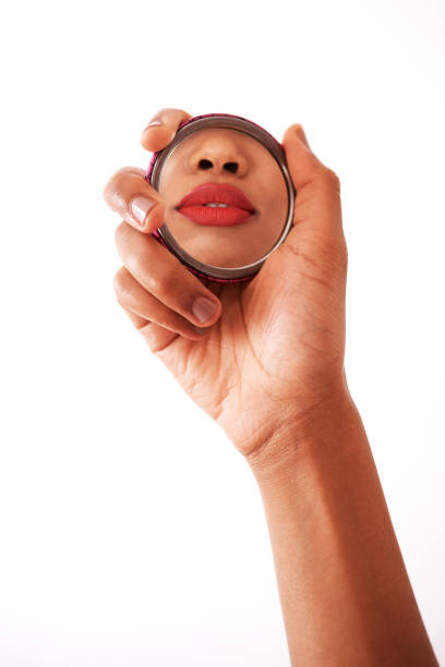 my lips are on point - mirror vanity women looking imagens e fotografias de stock