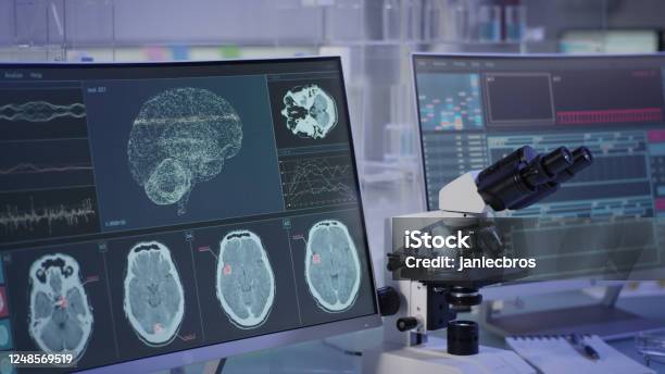 Futuristic Laboratory Equipment Brainwave Scanning Research On Computer Screens Stock Photo - Download Image Now