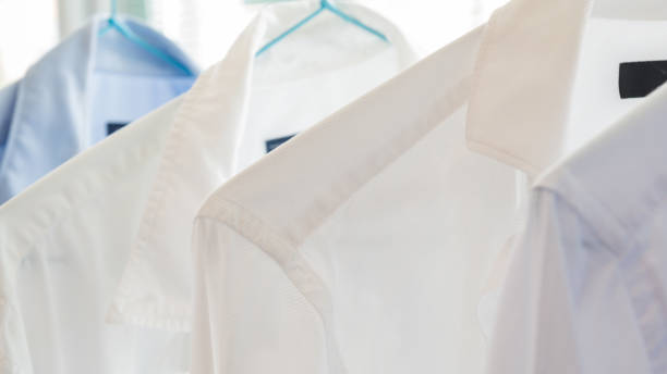 istock White and blue shirts at a dry cleaners 1248571779