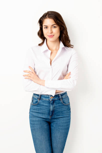 istock Confident young woman studio portrait at isolated background 1248572473