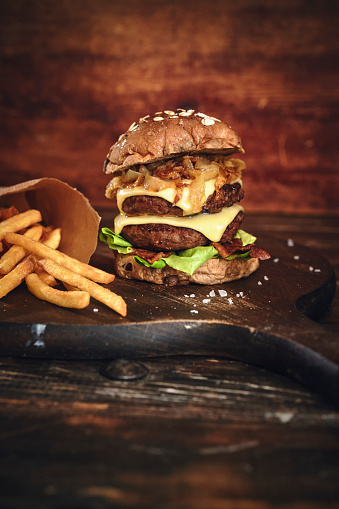Whole Grain Burger with Bacon, Roasted Onions Served with French Fries