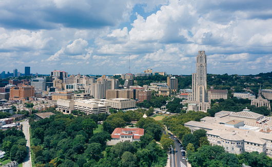 University of Pittsburgh, Hillman Library in Foreground. Cityscape in Background. Pennsylvania.