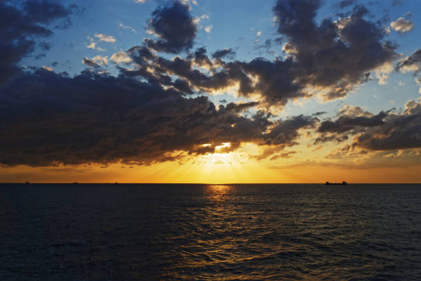 istock Golden sunset above sea 1248581931