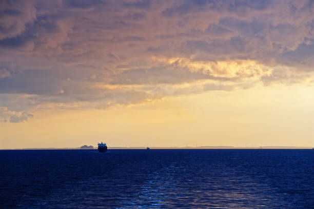 istock Colorful cloudy sky above sea 1248582183