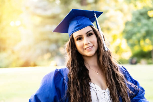 istock Smiling young woman celebrating her graduation 1248585167