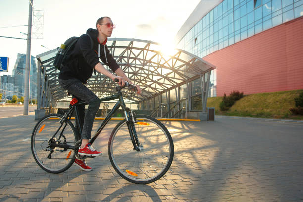 istock A tourist biker is sitting on a bicycle. 1248585380