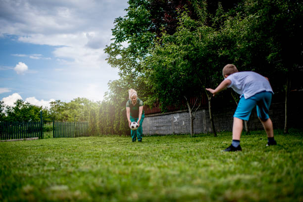 istock Playing soccer with grandmother 1248585769