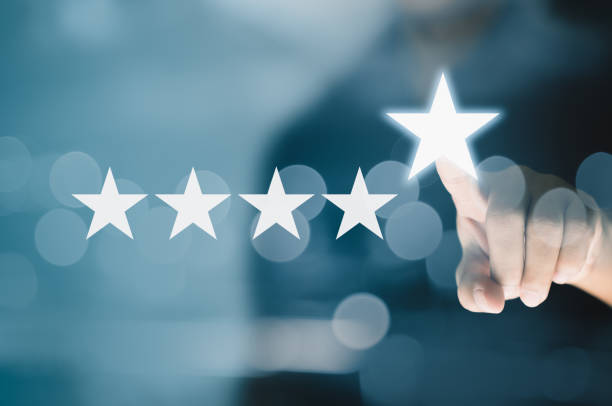 Five star rating review or evaluation of business  success and growth concept Hand pointing star symbol. Five stars rating. Reviews and Evaluation concept. Business growth and success. armed forces rank photos stock pictures, royalty-free photos & images