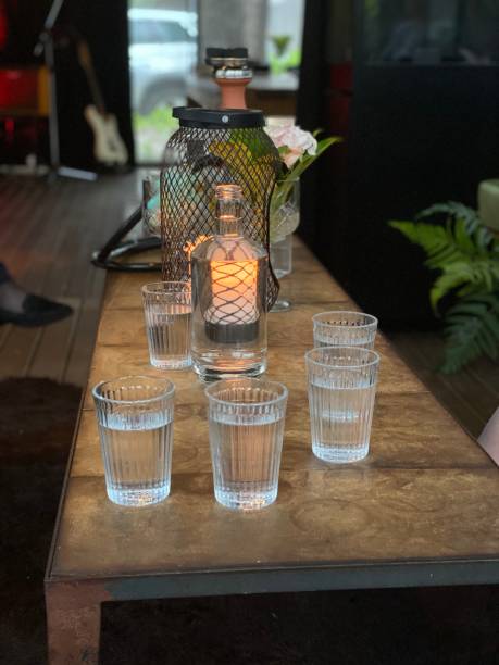 istock glasses of water on nicely decorate table in rum bar 1248588116
