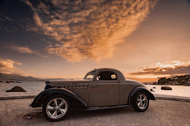 istock vintage car at sunset 1248592595