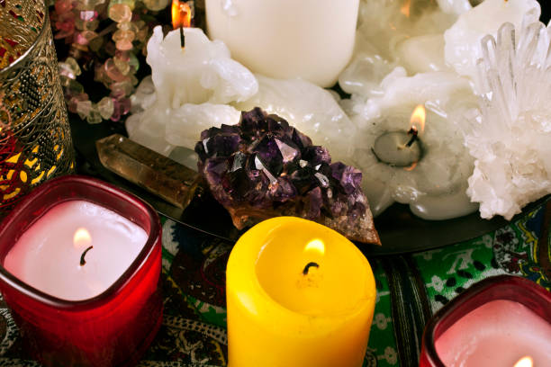 istock Candles with gemstones and crystals 1248594345