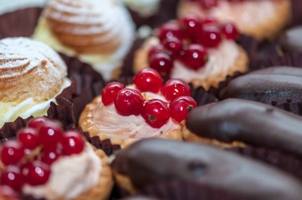 istock Cupcake with cream and fruits 1248594358