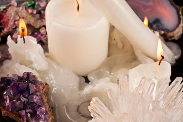 istock Candles with gemstones and crystals 1248594418