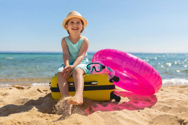istock Sandy beach and a happy little girl 1248601534