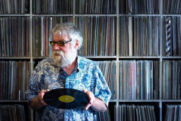 istock Record collector in front of his collection 1248604265