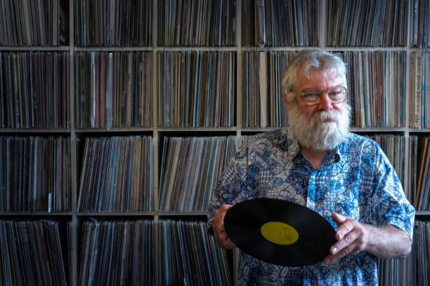 istock Record collector in front of his collection 1248604285