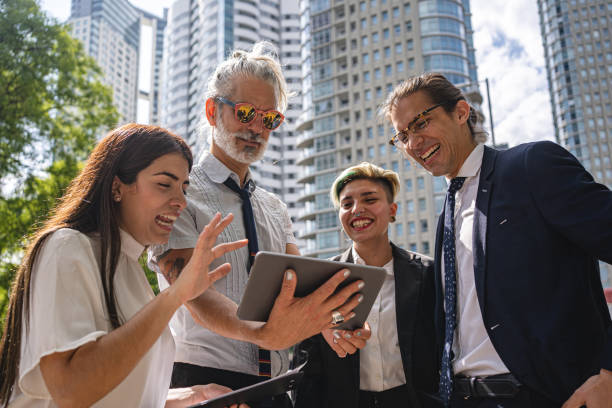 istock Businessman watching videos with his colleagues during work break 1248604319
