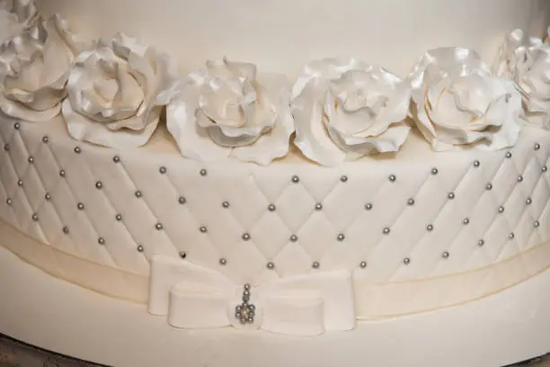 wedding cake decorated with  roses,flowers