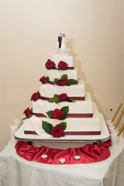 istock wedding cake decorated with  roses,flowers 1248604546