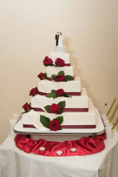 wedding cake decorated with  roses,flowers