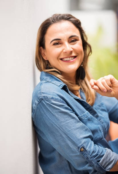 istock Beautiful woman smiling at camera 1248608819