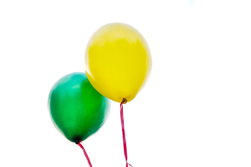 green and yellow balloon, white background