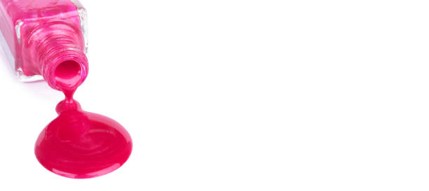 istock Spilled nail polish, closeup on white background 1248610675