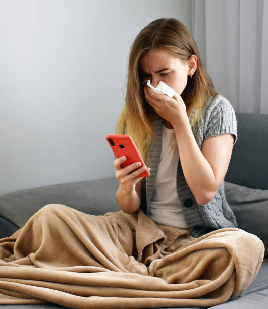 istock Woman sneezing 1248610791