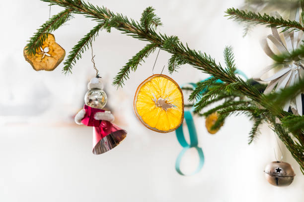 istock Close-up of decorated retro Christmas tree on a white background 1248612655