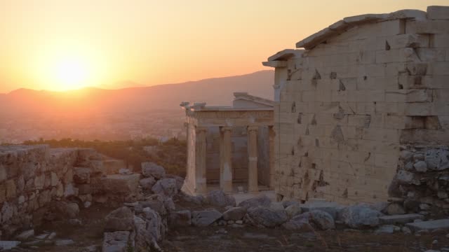 Landscape view over Porch of the Maidens, Erechtheion, Acropolis, Athens, Greece, at sunset
