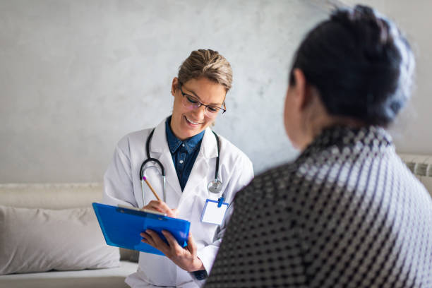 istock Healthcare worker at home visit 1248615644
