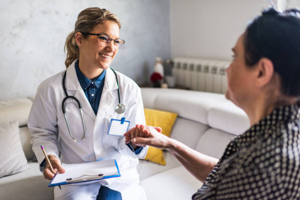 istock Healthcare worker at home visit 1248616842