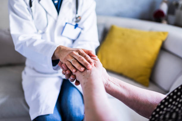 istock Healthcare worker at home visit 1248617064