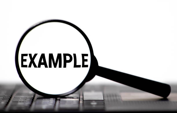 istock A concept image of a magnifying glass isolated white background with a word EXAMPLE zoom inside the glass 1248623930
