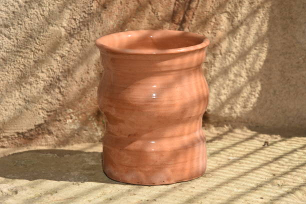 istock Artistic handmade ceramic clay brown terracotta pots 1248624611
