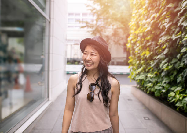 istock Young woman walking in city 1248626778