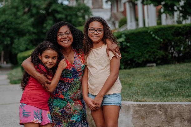 istock Black mother hugging her daughter 1248628269
