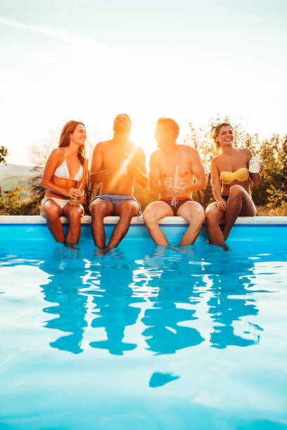 istock Summer cocktails and a good laugh by the pool 1248628340