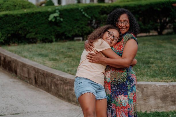 istock Black mother hugging her daughter 1248628456