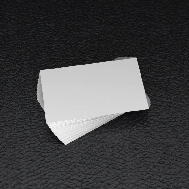 istock Blank business cards on a leather background mockup 1248630706
