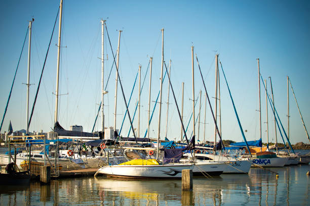 Boat, ocean and dock for marina, harbor and sailing with safety, storage and maintenance repairs. Yacht, water and sea for port, fishing and pier with tourism, leisure and cruise by coast