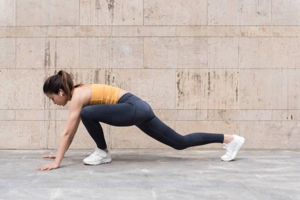 istock A young Asian woman is doing warm-up exercises 1248645449