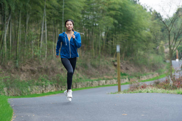 istock A young Asian woman is running 1248647013