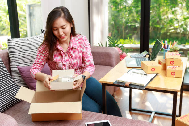 istock Seller prepare to send goods to customer after checking order. 1248648543